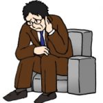 借金で落ち込む男性
